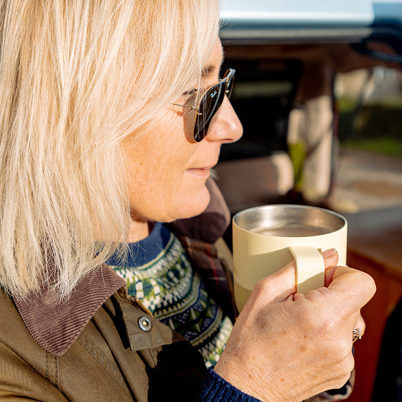 12oz-rise-mug-u5 12oz_rise_coffee_mug_wax_yellow_woman_drink_closeup_square.jpg