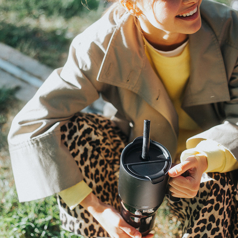 26oz-rise-tumbler-with-straw-lid-h6 26oz_rise_tumbler_black_woman_topview_square.jpg