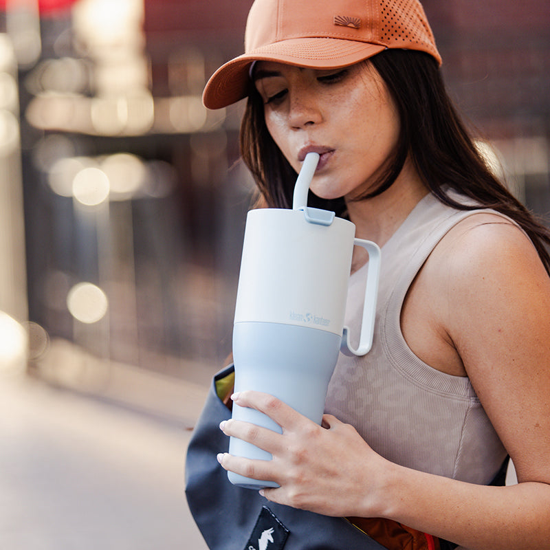 36oz-rise-tumbler-with-straw-lid-r7 36oz_rise_tumbler_straw_girl_sip_square.jpg
