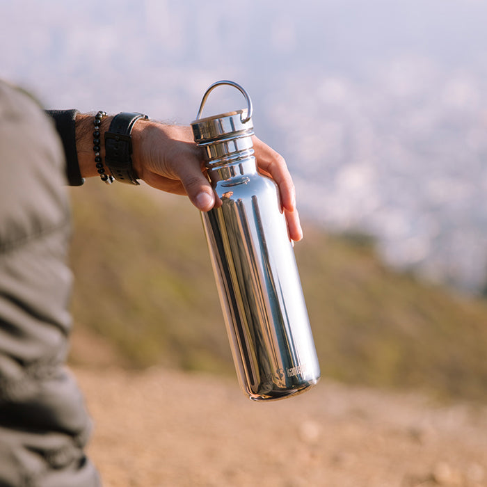27oz-reflect-with-bamboo-cap-s8 K27SSLRF-MS-BAMBOO_reflect_bottle_hand_lifestyle.jpg