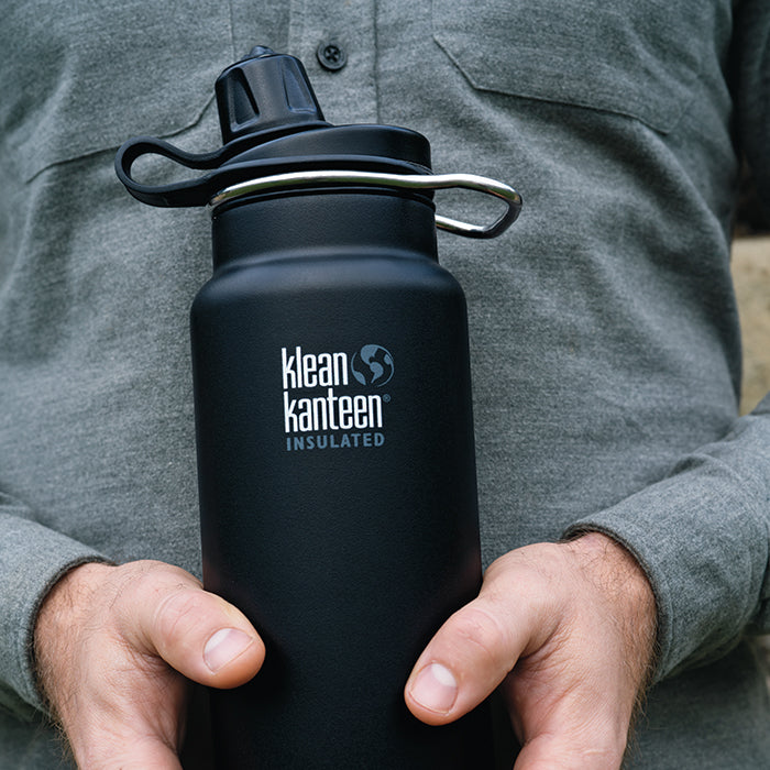tkwide-chug-cap-s0 K32TKWSSL-SB-Craddled-Bottle_closeup_lifestyle.jpg
