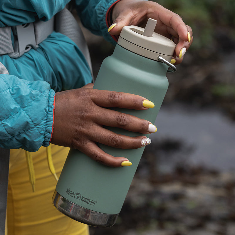 32oz-tkwide-made-to-do-more-bundle-y9 tkwide_32oz_insulated_bottle_twist_closeup_seapsray_hand_square.jpg
