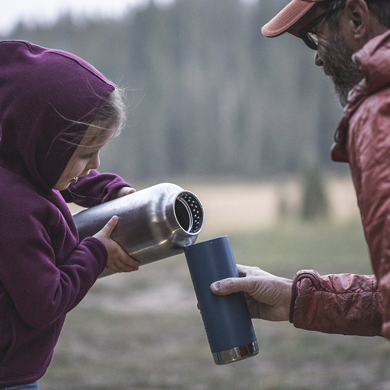 64oz-tkwide-with-loop-cap-t2 tkwide_64oz_bottle_girl_dad_filling_square.jpg